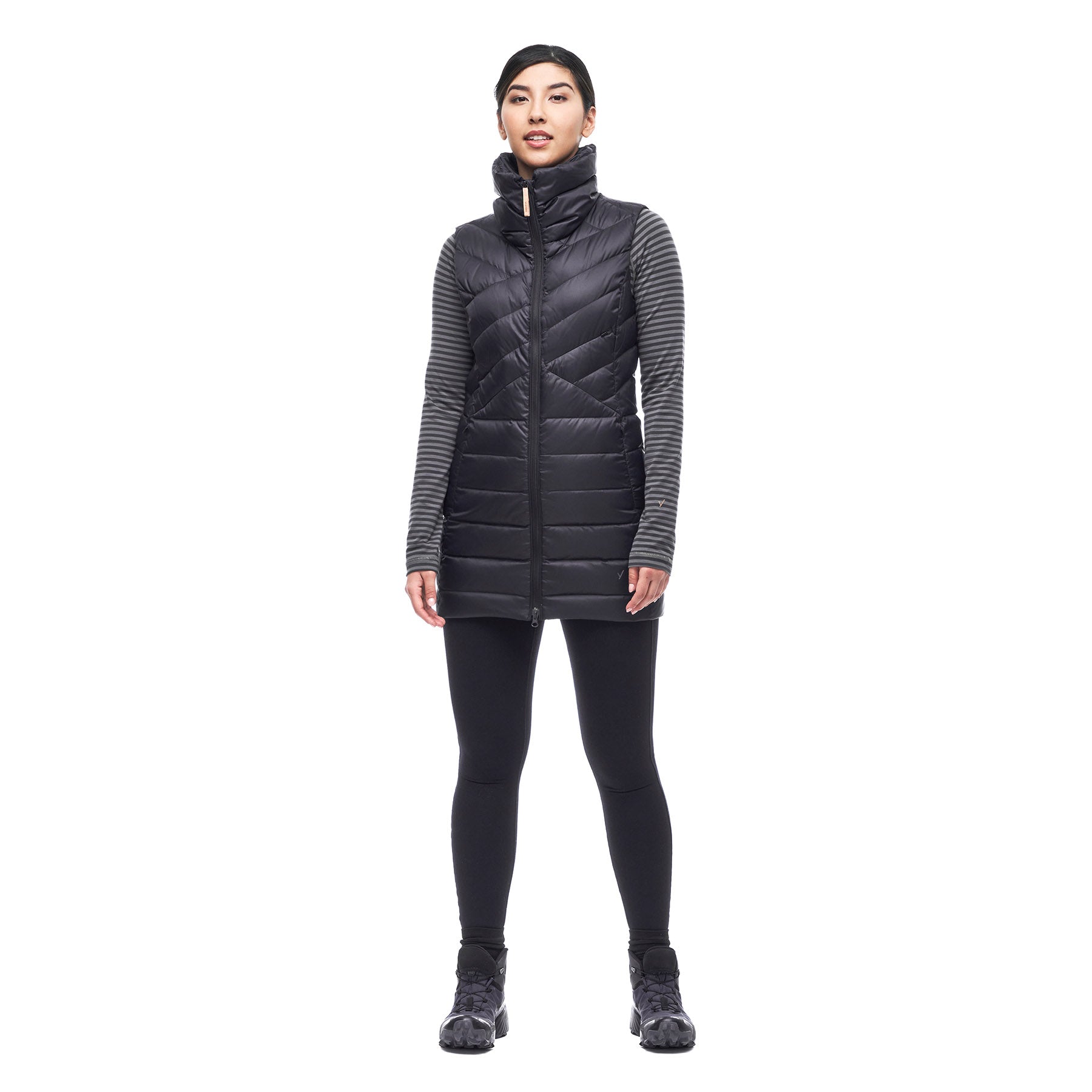Hero image featuring a female model wearing the Indyeva Kapa sleeveless vest in black.