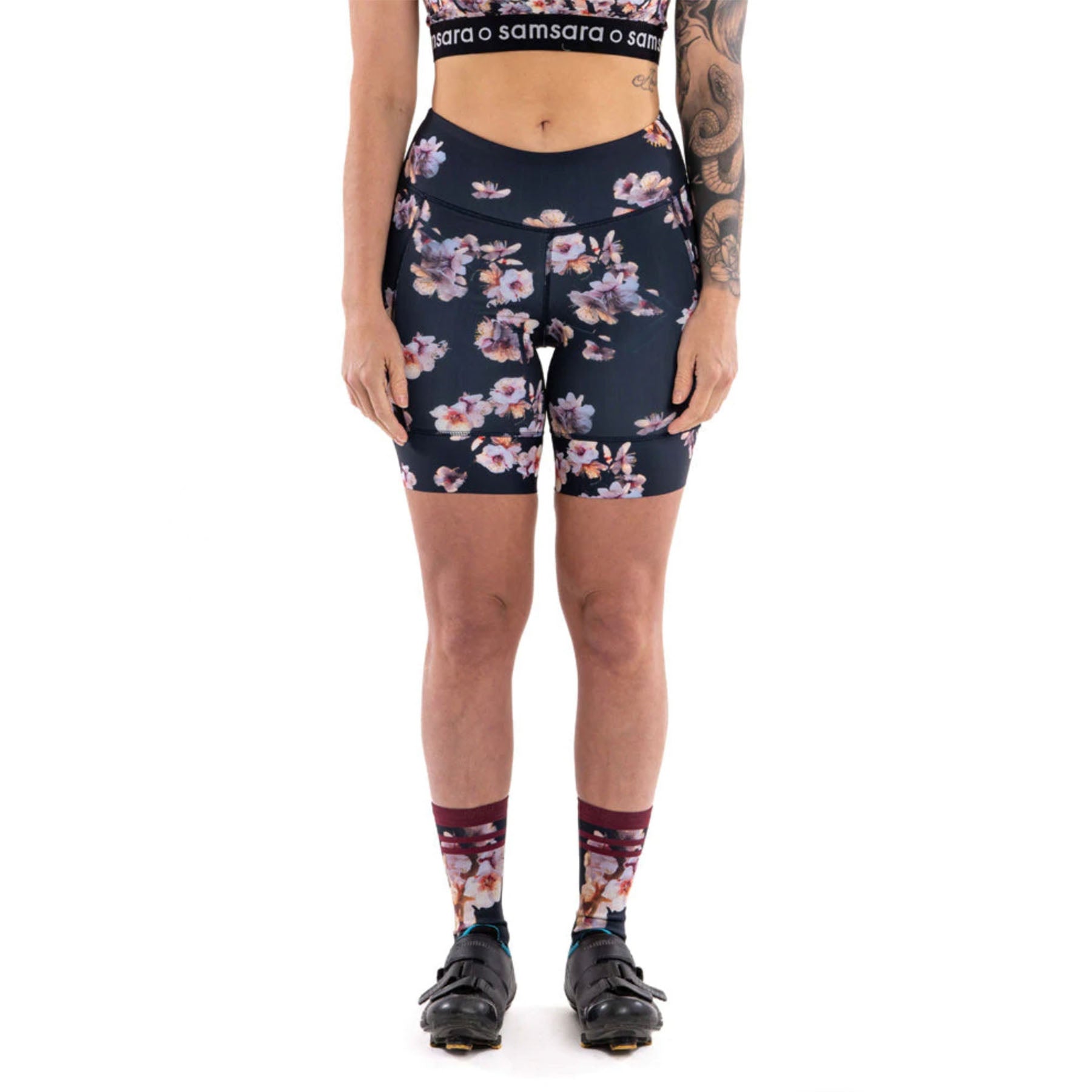 Hero image featuring the front of the Samsara performance 7" cycling shorts in cherry blossom