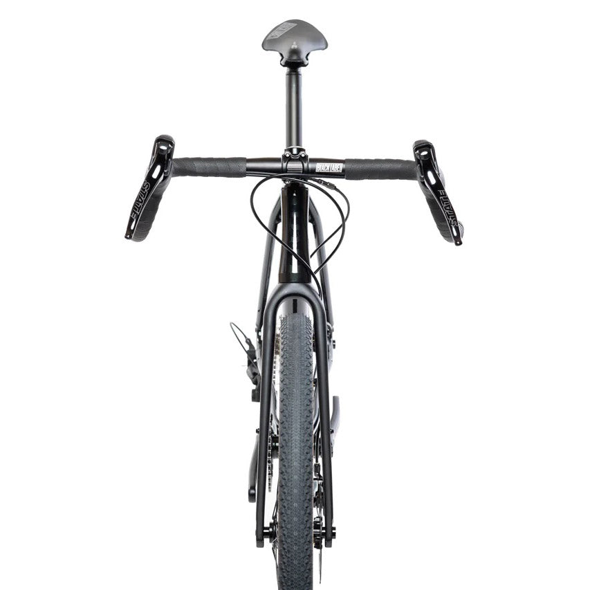 Image features a front facing look at the State 6061 Black Label All-Road bike in dark woodland green.