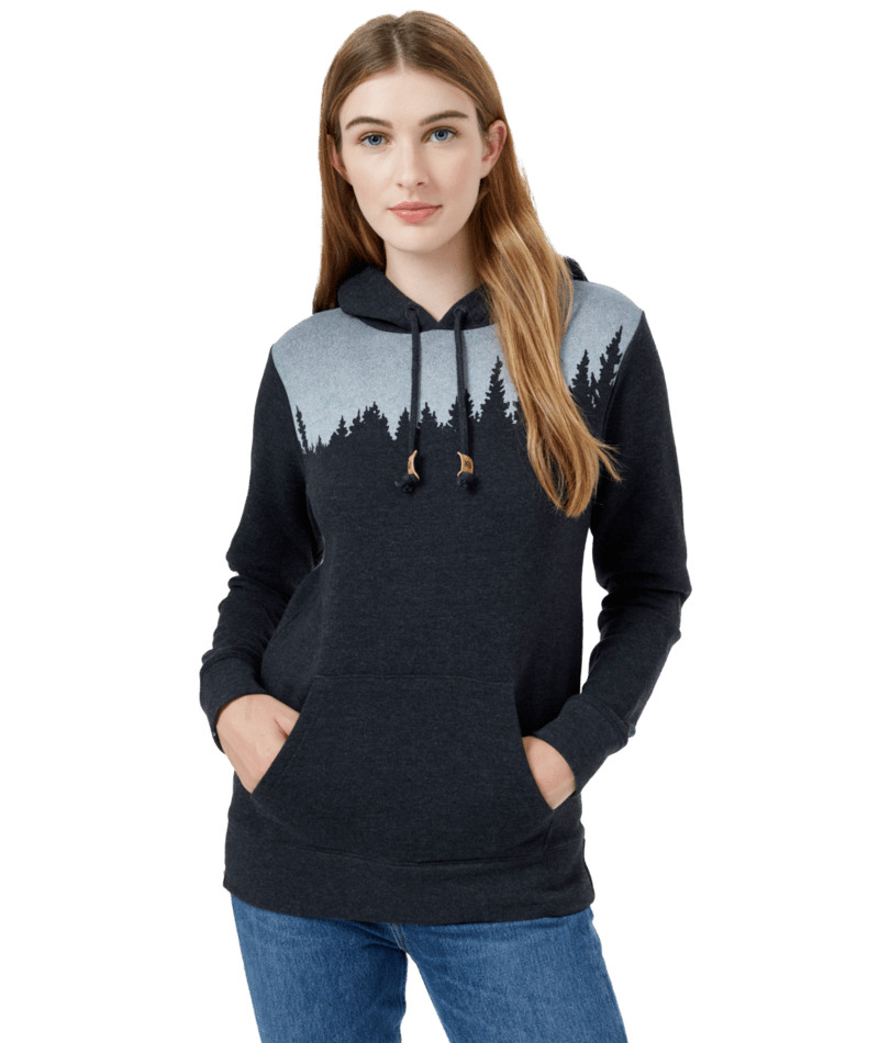 Hero image featuring a female model wearing blue jeans and the Ten Tree Juniper Hoodie in Meteorite black.