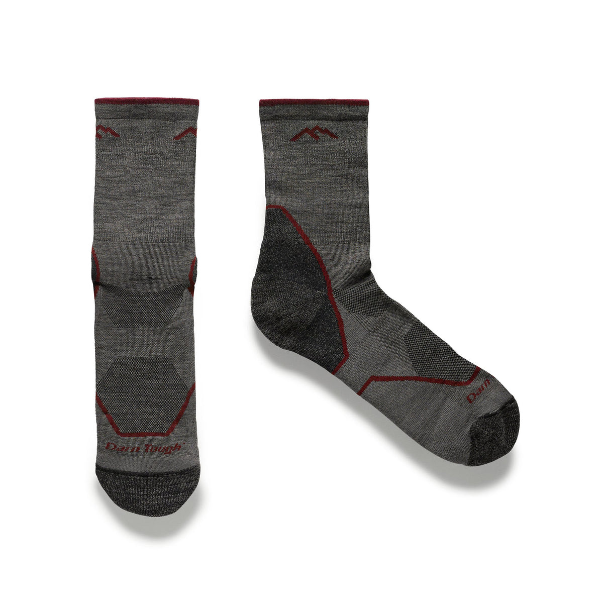 Hero image of the Micro Crew Hiking sock in the taupe colorway. One sock is flat up and down overlooking the top of the sock while the other sock is displayed with a side profile