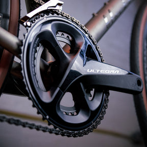 Image features the right pedal and chain on the BSC Ti road bike