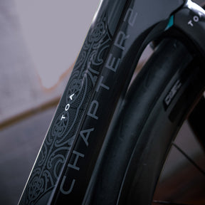 Image features an up close shot of the branded frame on the Chapter 2 TOA