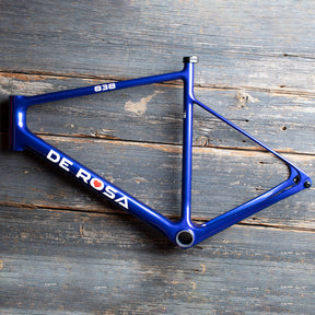 Flat lay image of the De Rosa 838 frameset in blue