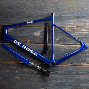 Flat lay image of the De Rosa 838 frameset in blue