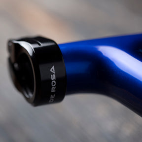 Zoomed in photo of the portion of the De Rossa 838 frameset in blue that connects to the seat