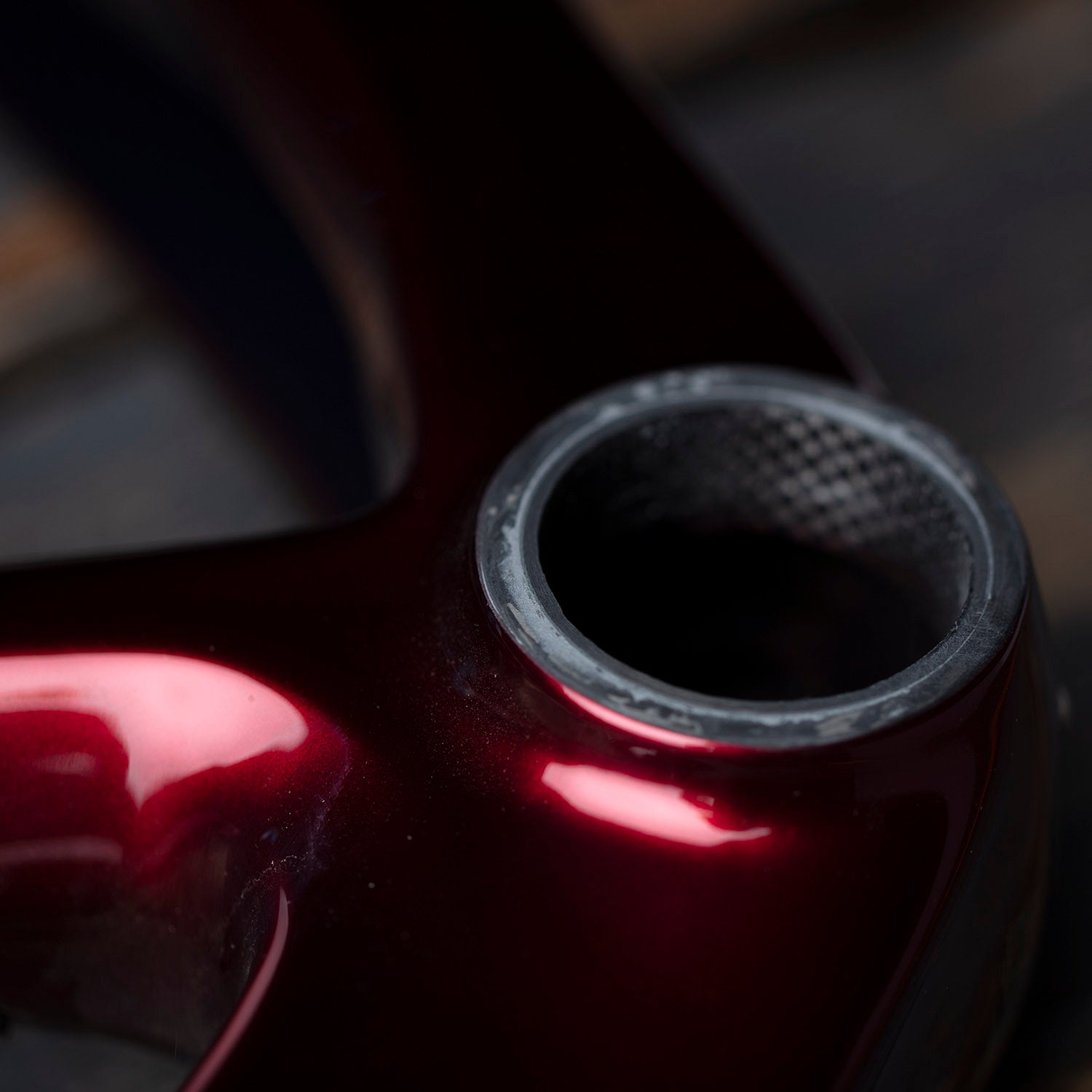 Close up image of the pedal insert for the De Rosa frameset in maroon.