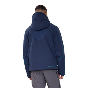 Image features the back of a male model wearing the Obermeyer Admiral Jacket in admiral blue with light grey ski pants.