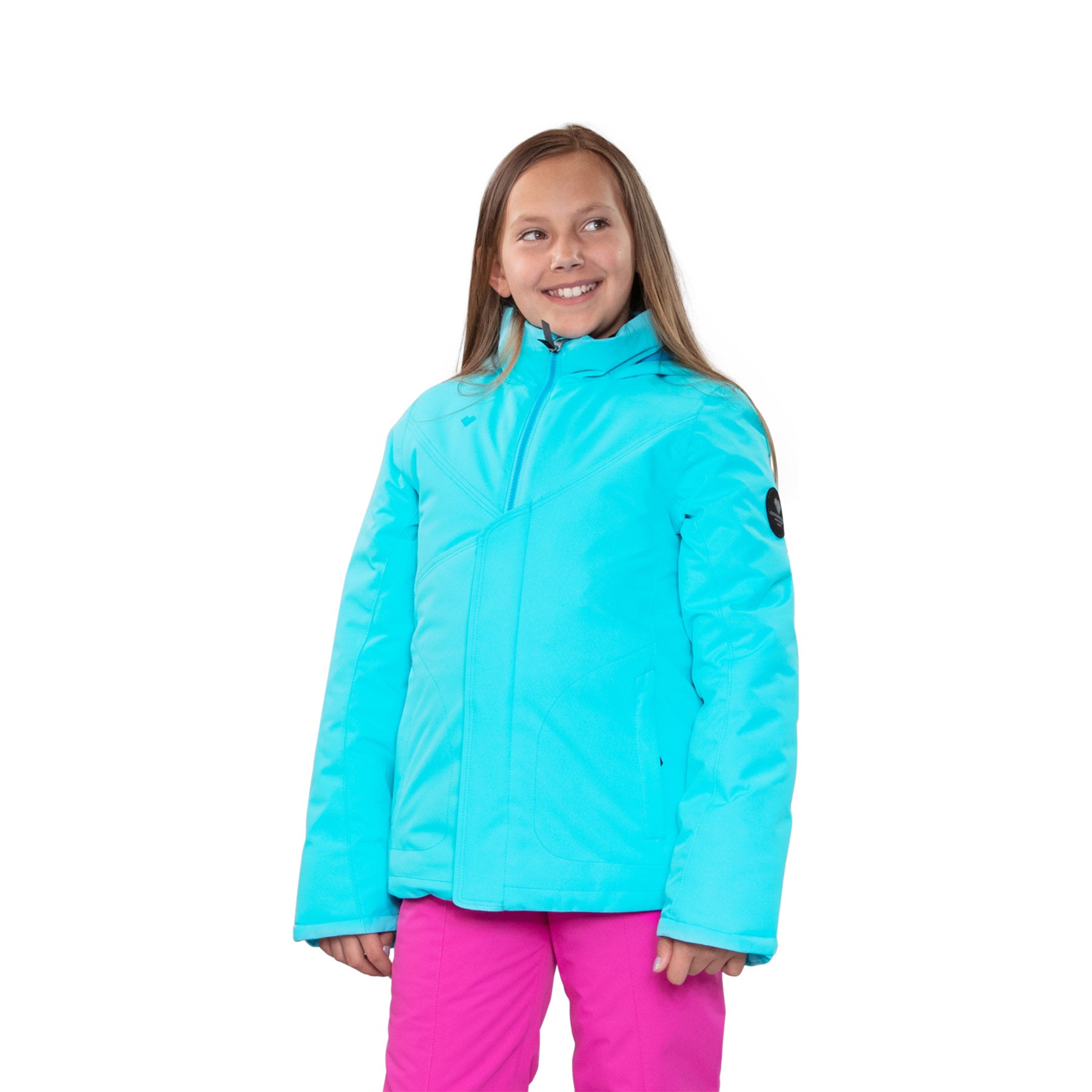 Image features a female model wearing the Obermeyer girls Rylee Jacket in Colorado Sky blue with bright pink ski pants.
