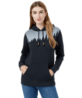 Hero image featuring a female model wearing blue jeans and the Ten Tree Juniper Hoodie in Meteorite black.